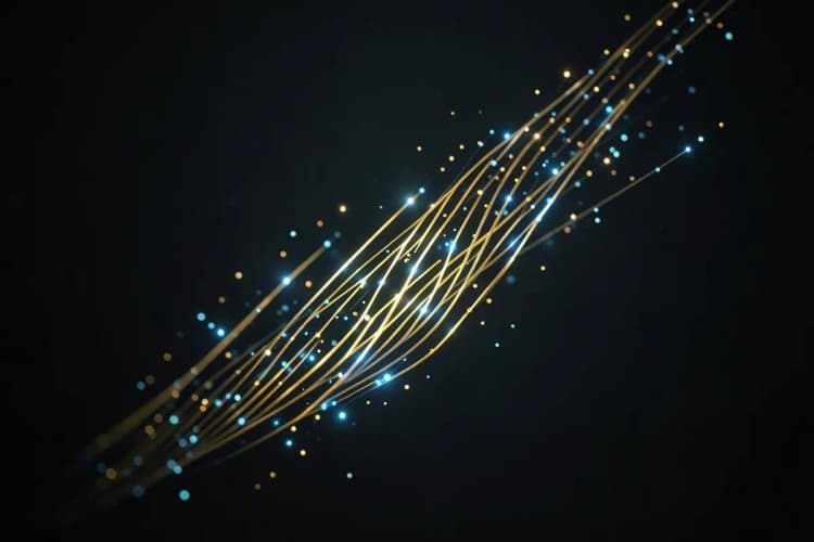 Um gráfico abstrato com linhas ascendentes e pontos luminosos em tons de dourado e azul, sobre fundo escuro.